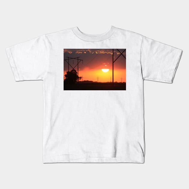 Kansas Blazing Orange Sunset  with cloud's Kids T-Shirt by ROBERTDBROZEK